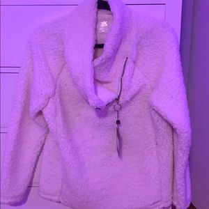 A white Sherpa sweater